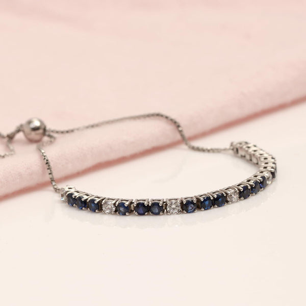 925 Sterling Silver Rhodium Plated Blue Sapphire and Cubic Zirconia Tennis Sliding Bolo Bracelet for Women